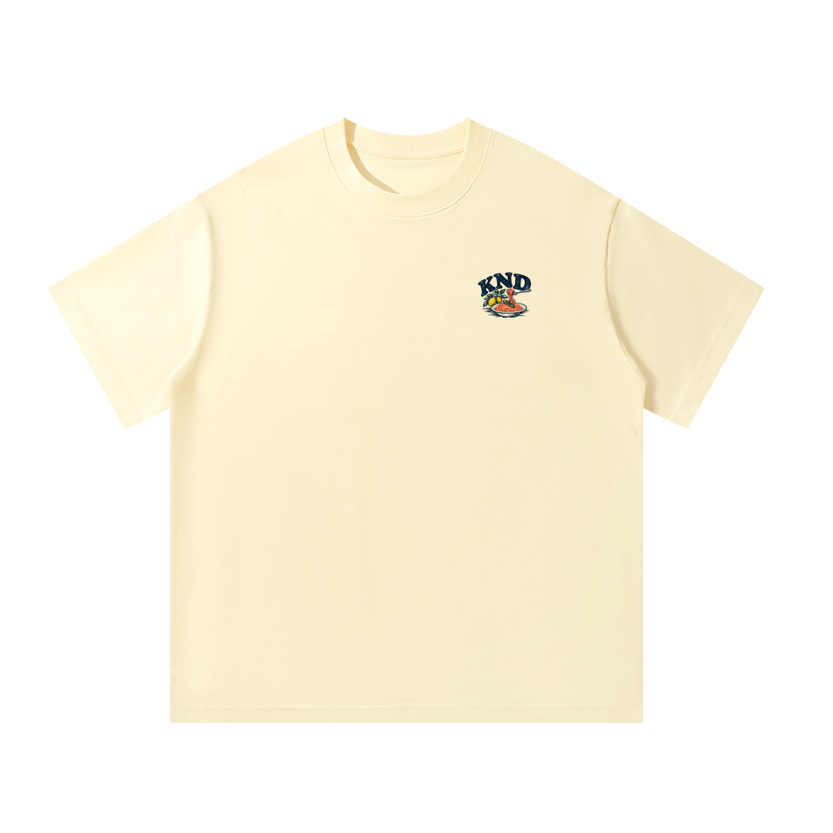 La Vita È Bella Tee, Apricot — front view with the small KND mark, lemons and a bowl of spaghetti, on the left chest