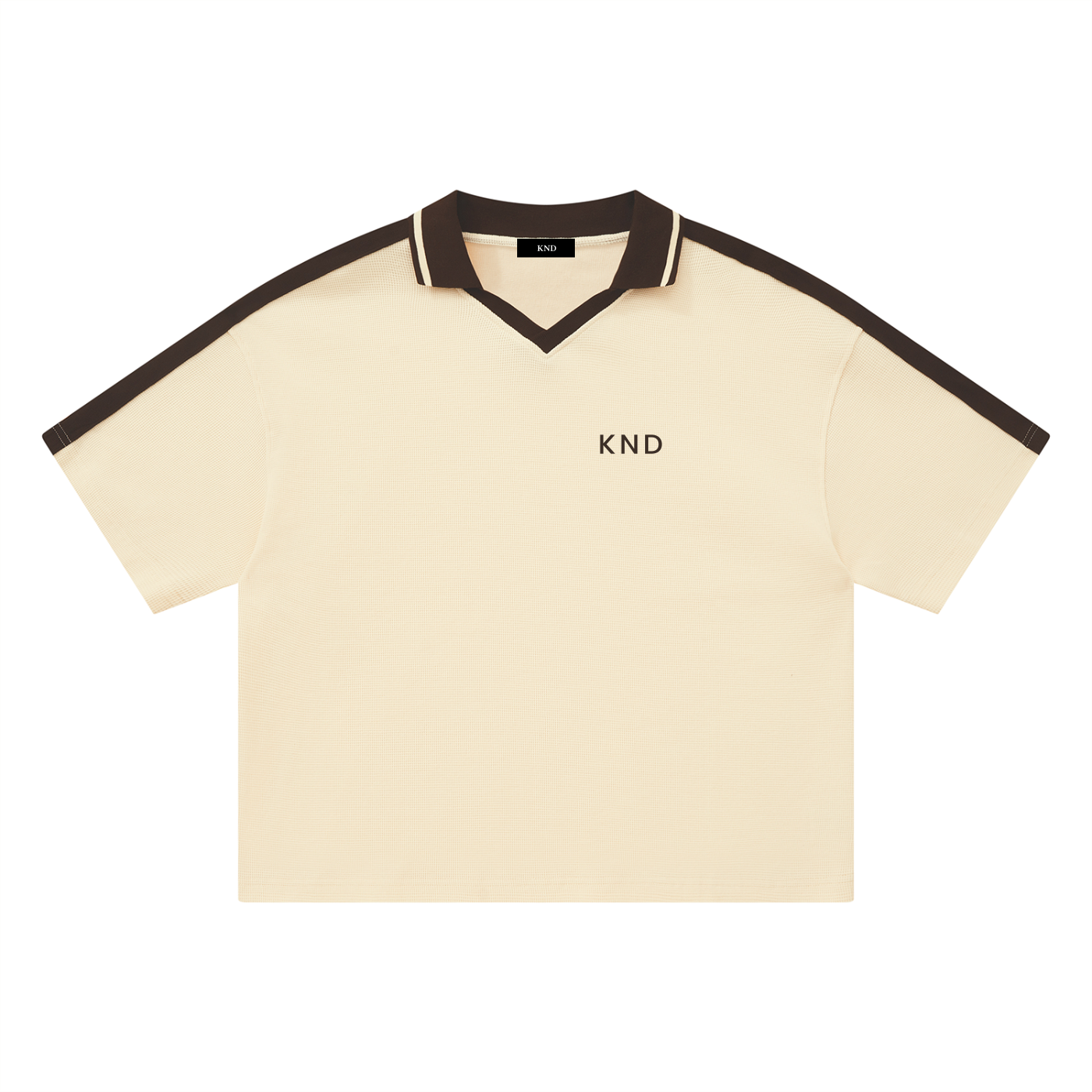 KND Brand Color Block Waffle Polo in apricot with brown contrast collar, shoulder stripes and V-panel, front view