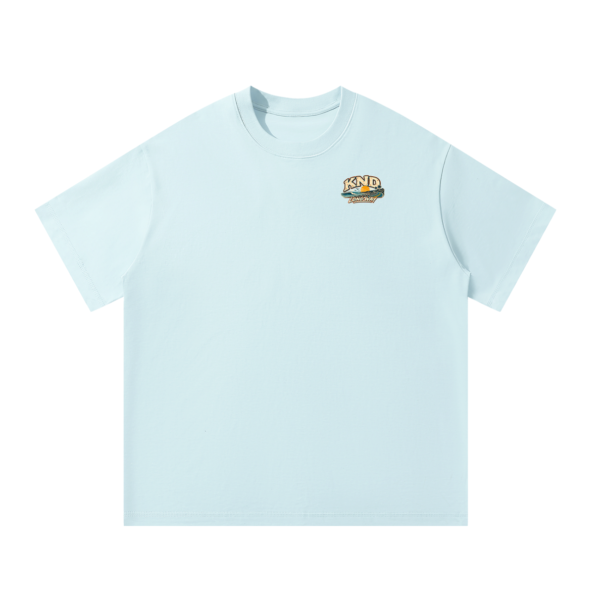 Take the Long Way Tee, Sky Blue — front view with the small KND coast-road-and-sunset mark on the left chest