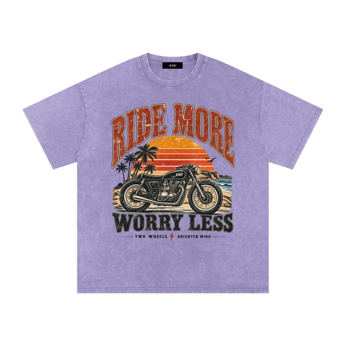 Ride More Worry Less Washed Tee, Light Purple — front print, café-racer motorcycle and coastal sunset graphic