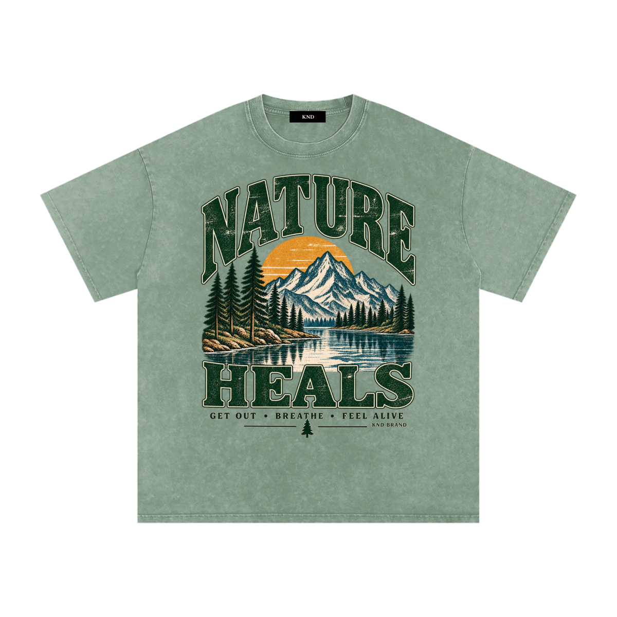 Nature Heals Washed Tee, Bean Green — front print, alpine lake, snow-capped peak and sunrise graphic