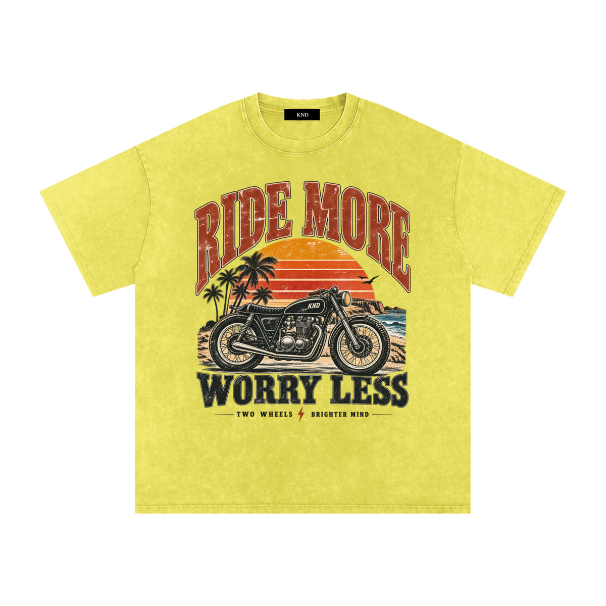 Ride More Worry Less Washed Tee, Olive Yellow — front print, café-racer motorcycle and coastal sunset graphic