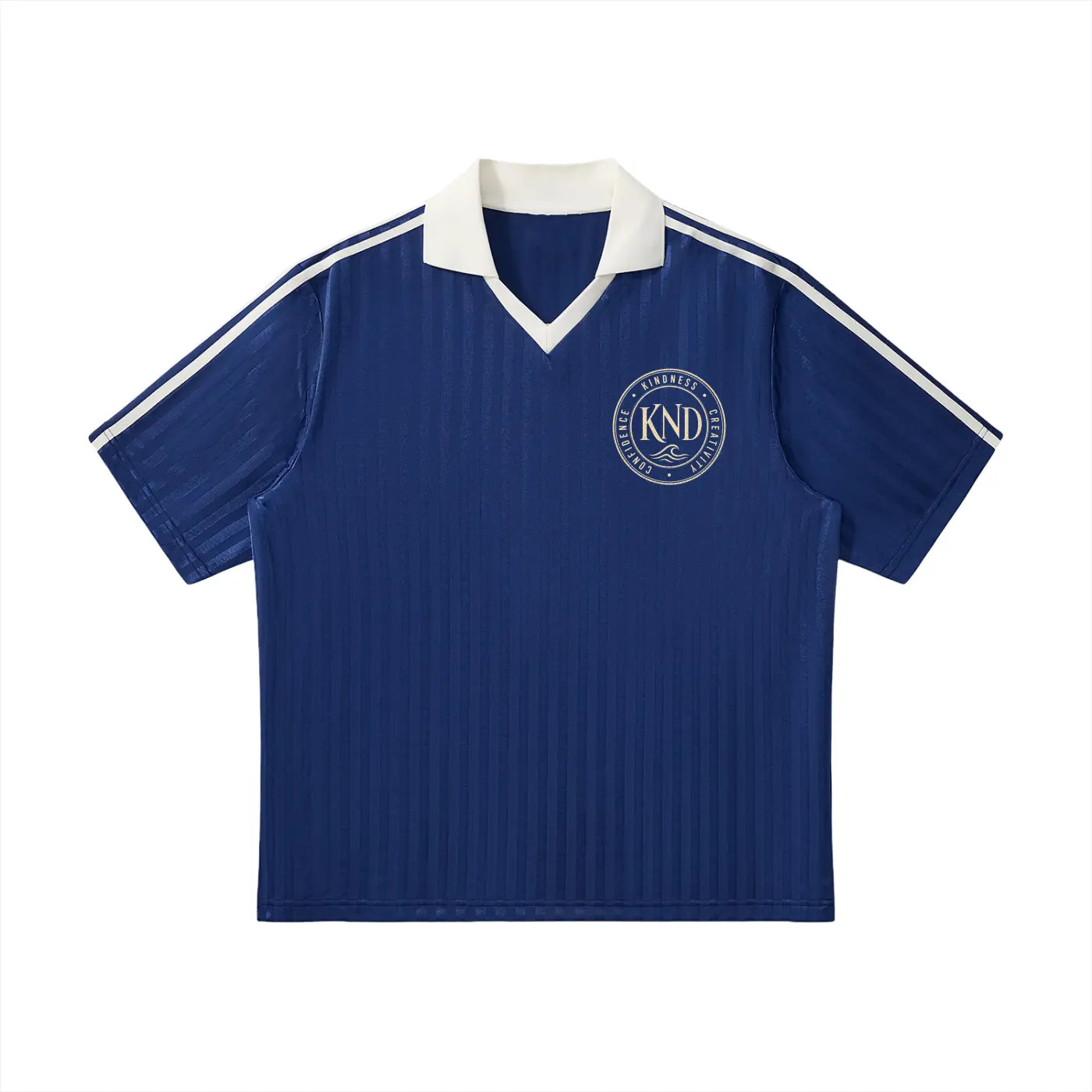 KND Coastal Crest navy soccer jersey flat lay with white contrast trim