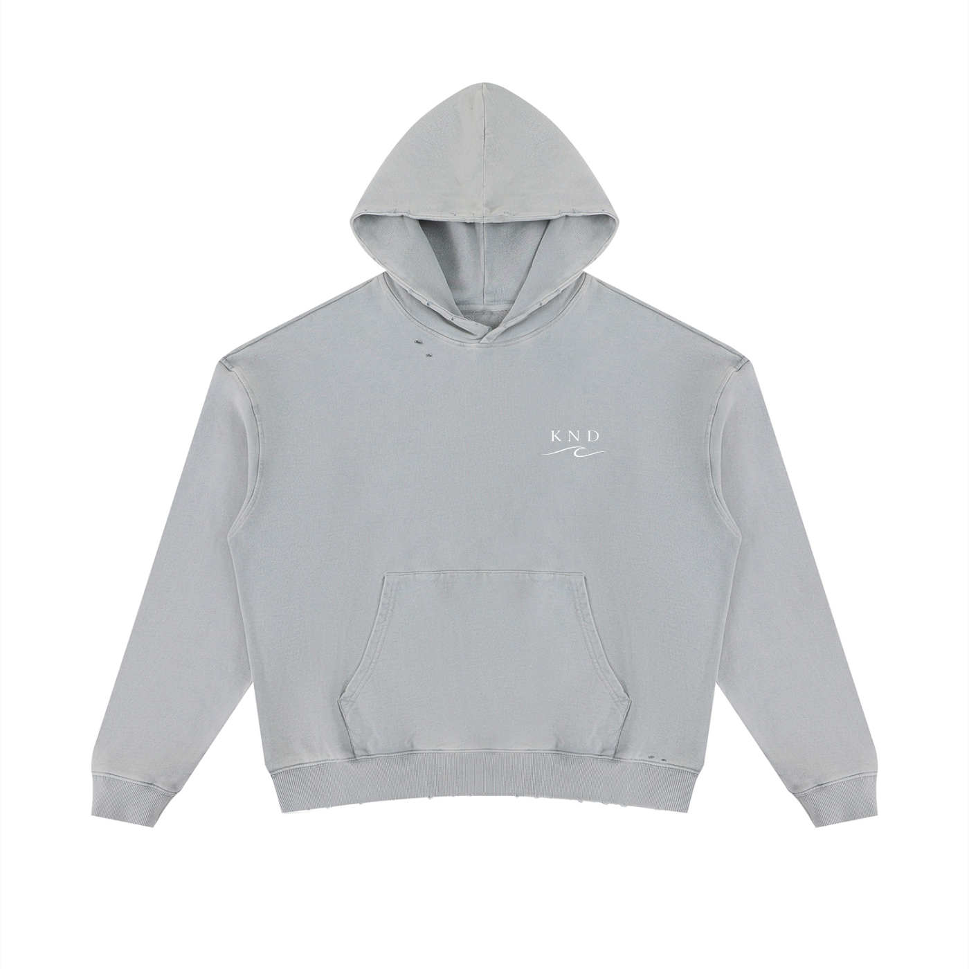 Close detail of hand-distressed rips and washed cotton texture on the KND Brand mineral wash hoodie