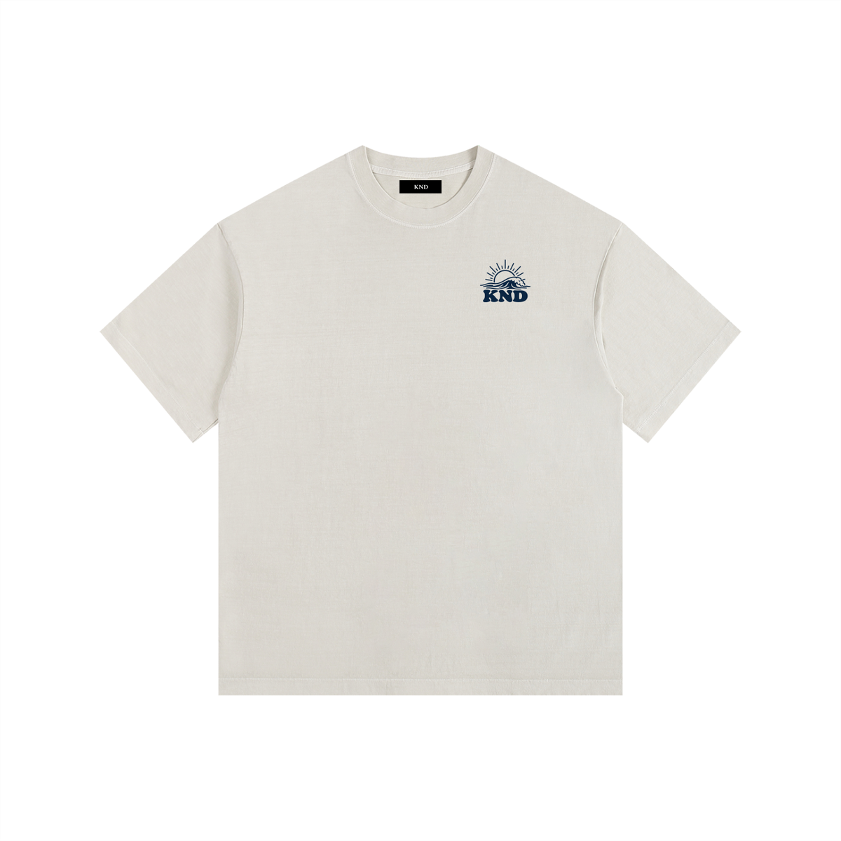 Daybreak Washed Tee, Light Apricot — front view with the small KND sunrise mark on the left chest