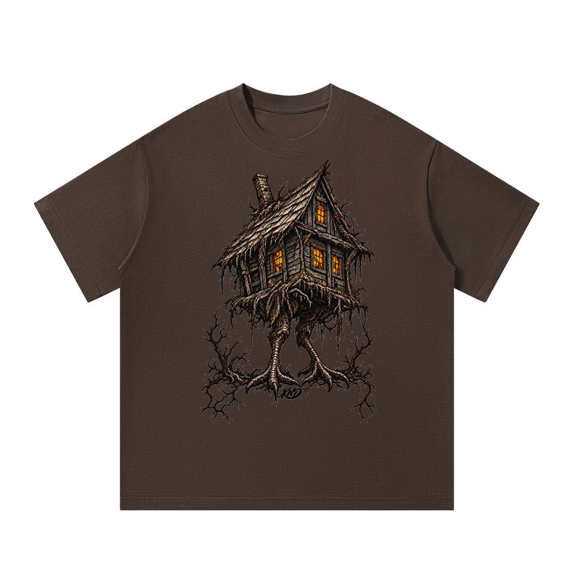 Baba Yaga Rootbound Tee, Coffee — front view with a detailed print of Baba Yaga's weathered hut on gnarled bird legs among bare branches, amber windows lit