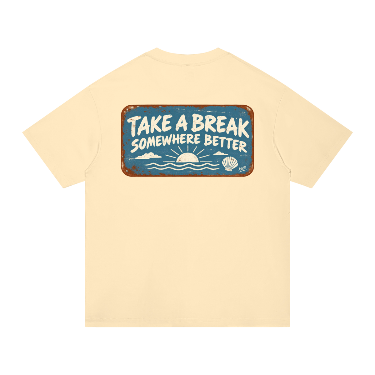 Take a Break Tee, Apricot — back print, rust-edged enamel sign reading Take a Break Somewhere Better over a sunset and a scallop shell