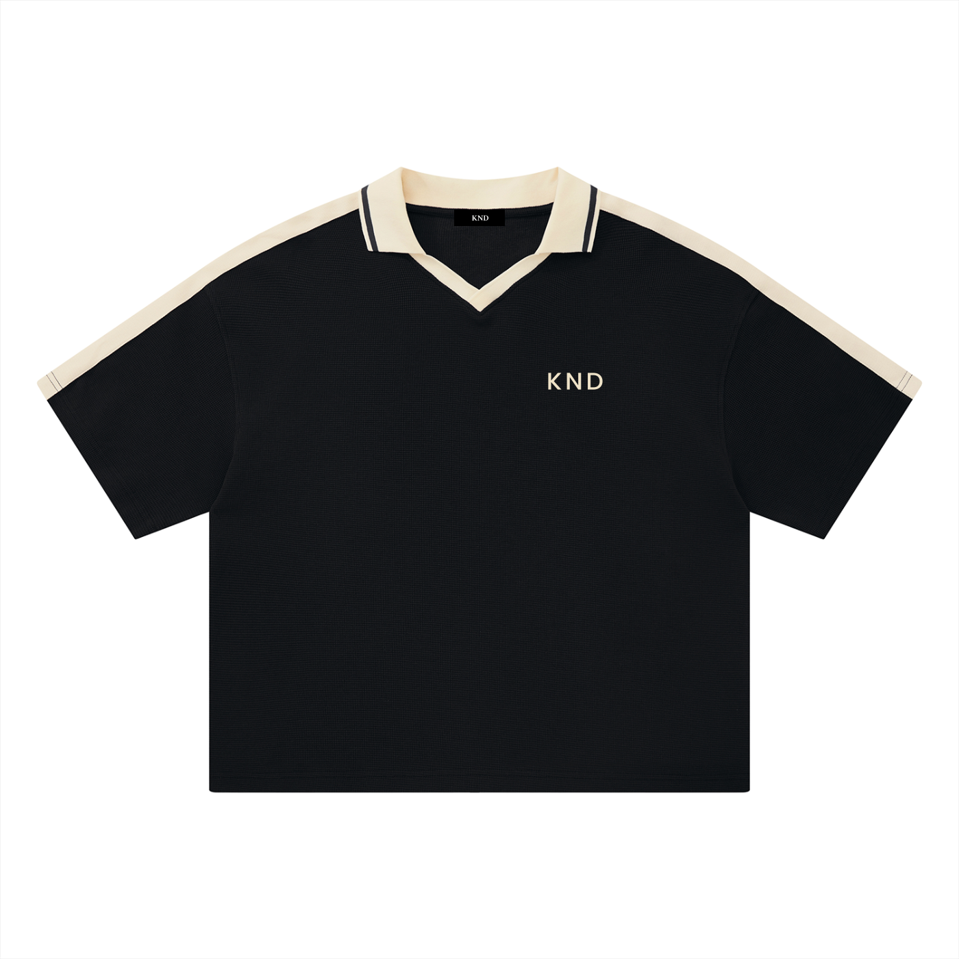 KND Brand Color Block Polo Jersey in black with ivory contrast collar, shoulder stripes and V-panel, front view
