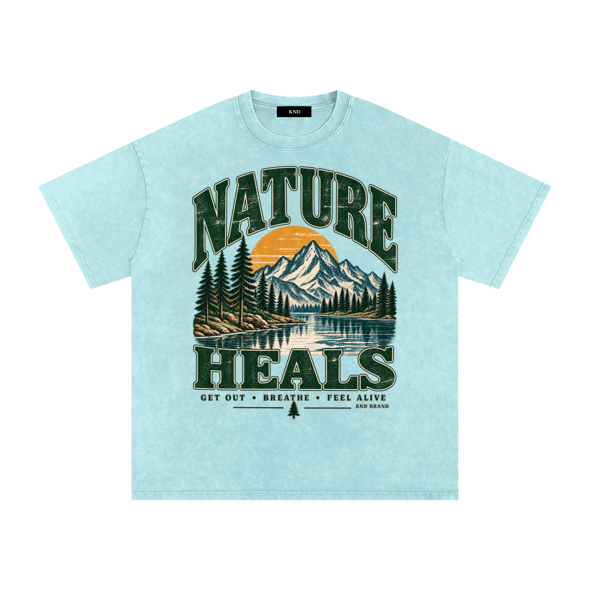 Nature Heals Washed Tee, Water Blue — front print, alpine lake, snow-capped peak and sunrise graphic