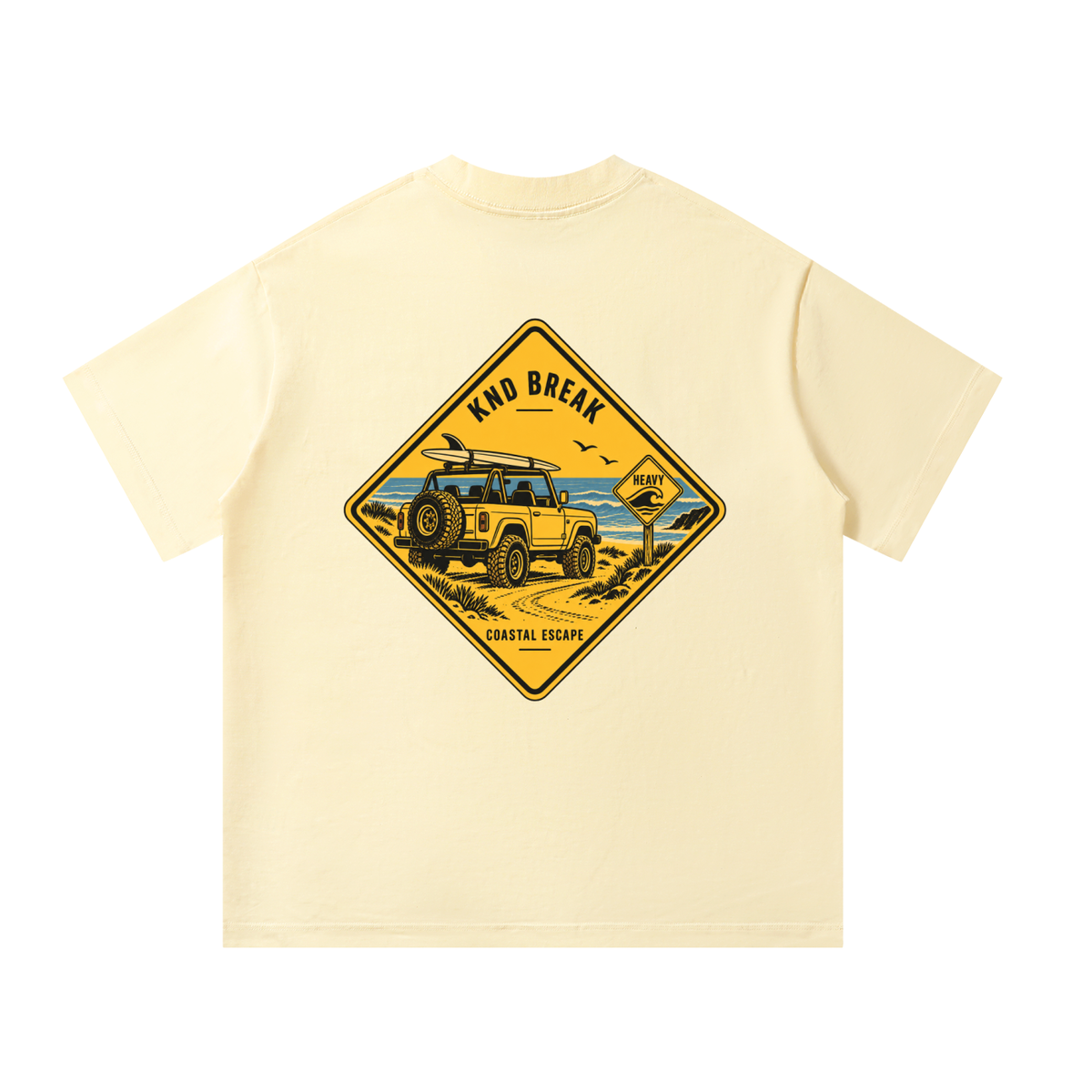 Coastal Escape Tee, Apricot — back print: a vintage 4x4 with a surfboard on a sandy beach track inside a yellow diamond road sign reading “Coastal Escape”