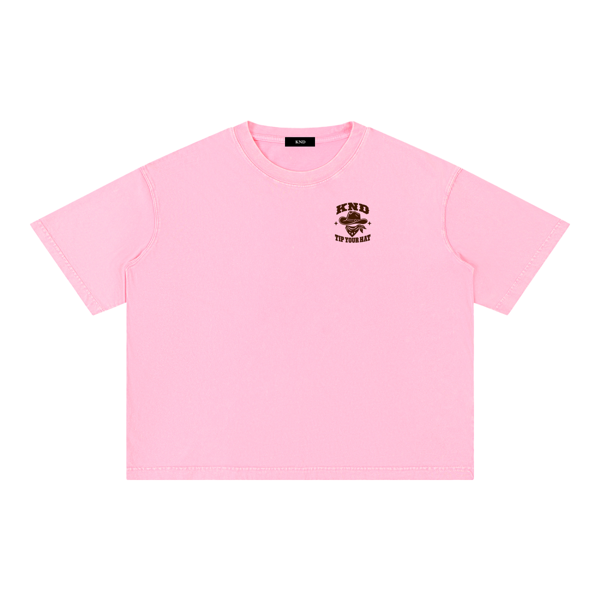 Tip Your Hat Washed Tee, Rose Pink — front view with a small graphic of a cowboy hat above a knotted bandana between two small stars on the left chest