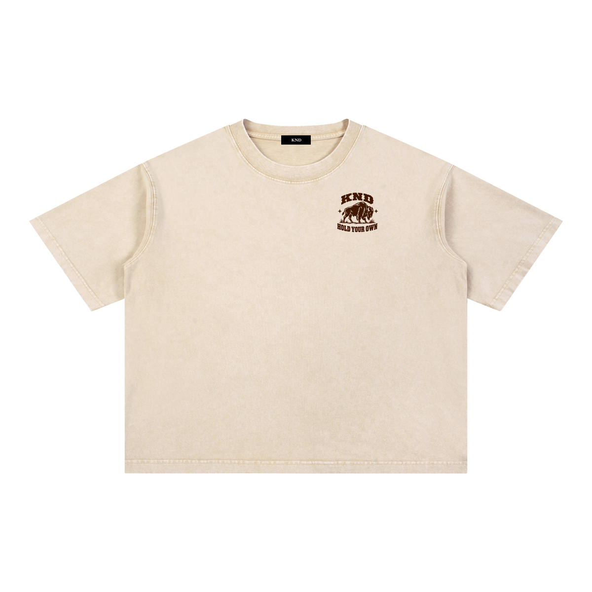 Hold Your Own Washed Tee, Light Apricot — front view with a small graphic of a bison walking through prairie grass between two small stars on the left chest
