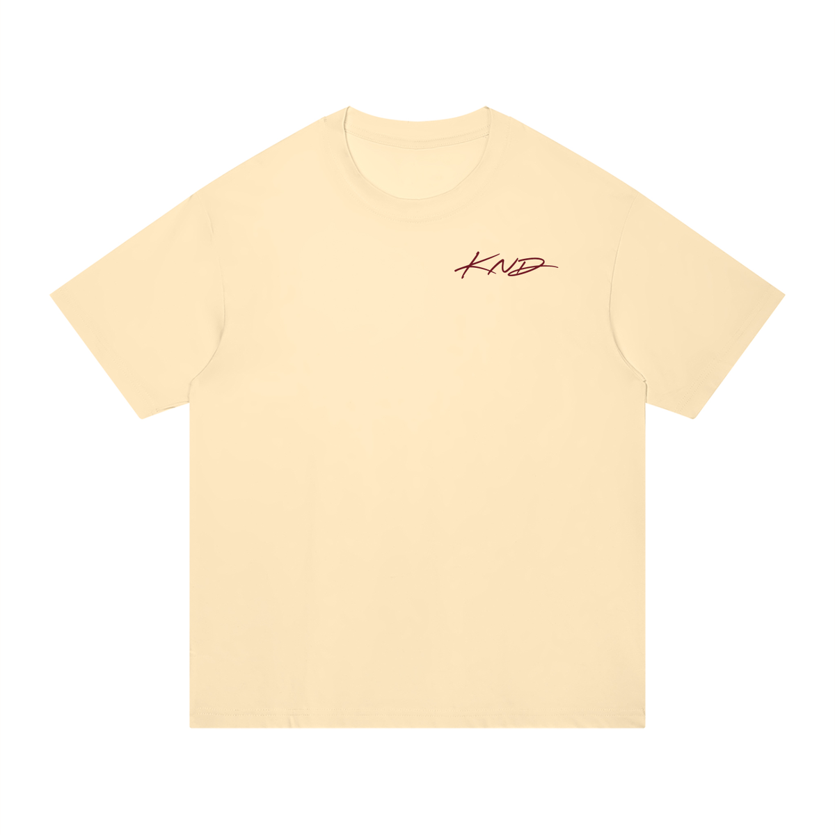 Take a Break Tee, Apricot — front view with the small KND script mark on the left chest