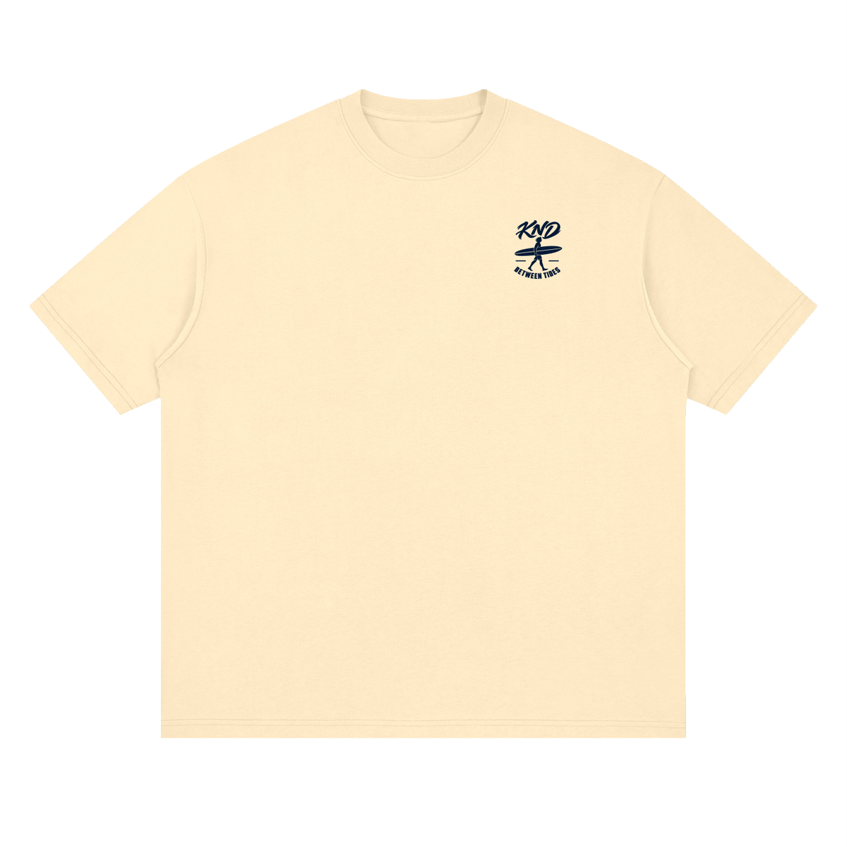 Between Tides Tee, Light Apricot — front view with a small graphic of a surfer walking with a board under one arm between two thin lines on the left chest