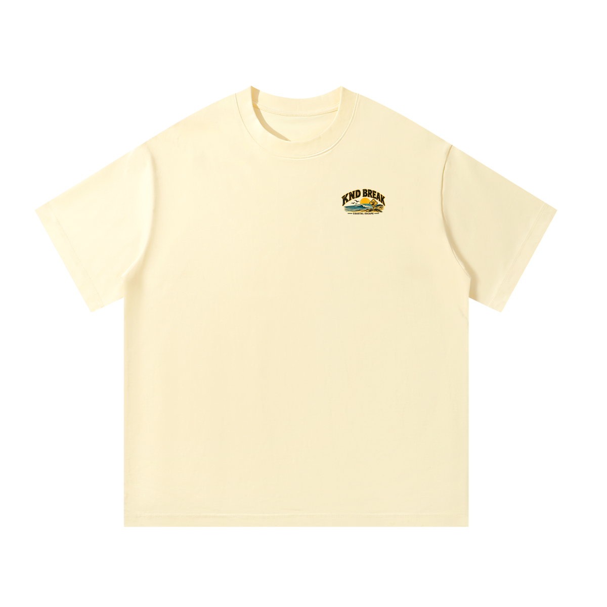Coastal Escape Tee, Apricot — front view with the small road-sign scene on the left chest