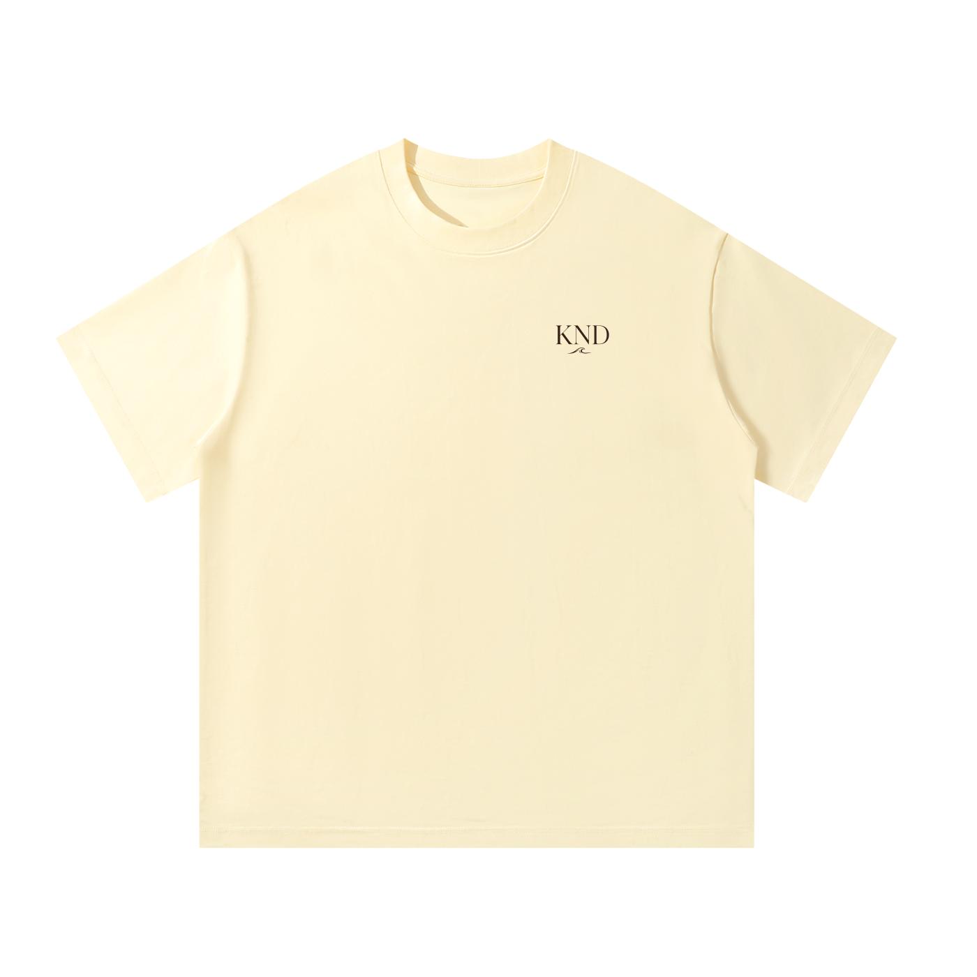 Apricot KND Brand heavyweight oversized tee, front view with small KND wave logo at left chest