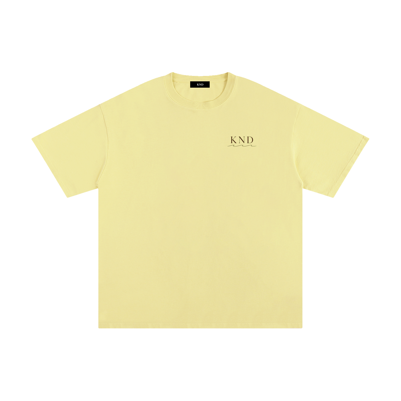 Light yellow KND Brand oversized drop shoulder tee, front view with small KND wave logo at left chest
