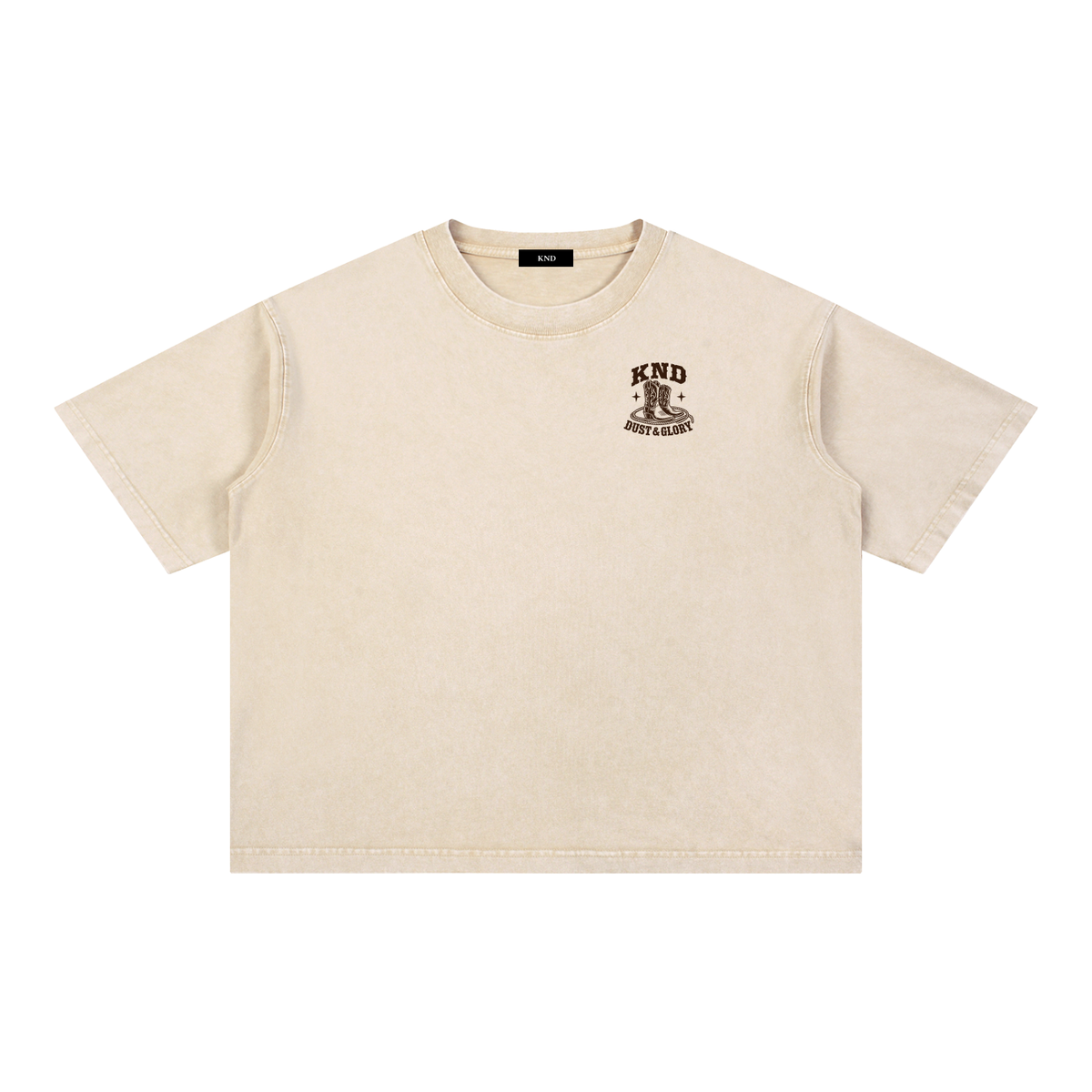 Dust & Glory Washed Tee, Light Apricot — front view with a small graphic of cowboy boots inside a coiled lasso between two small stars on the left chest
