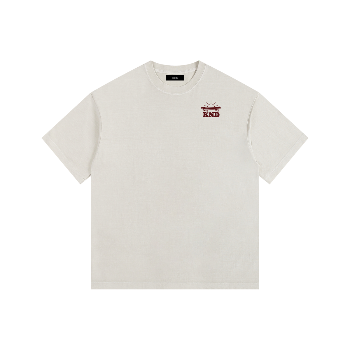 Take Your Time Washed Tee, Light Apricot — front view with the small KND sun-and-board mark on the left chest