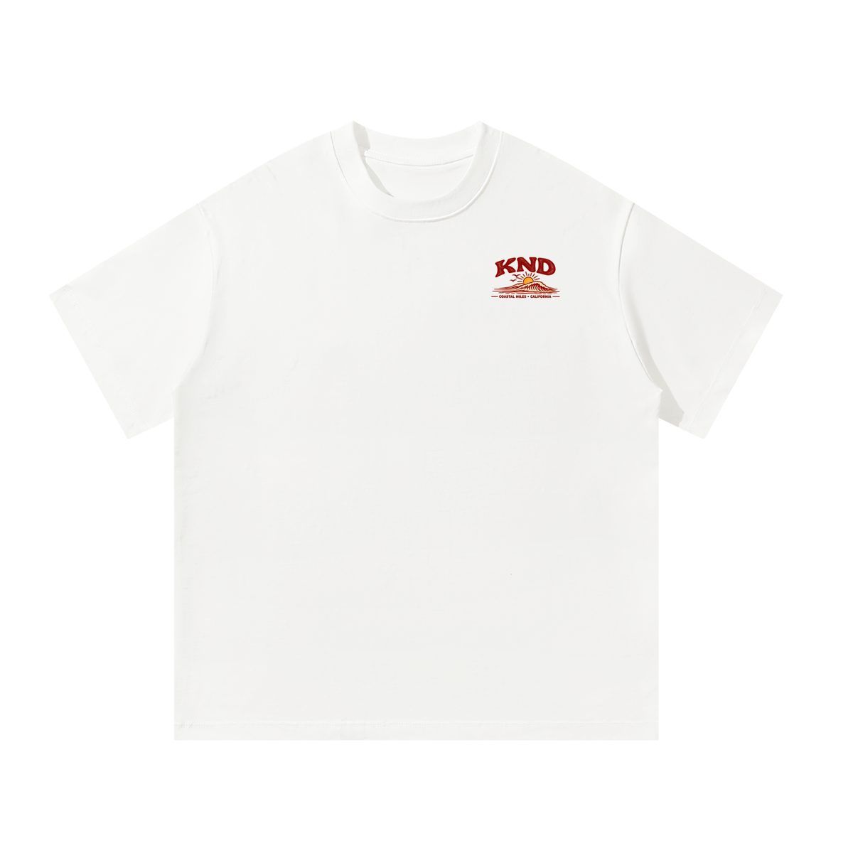 Coastal Miles Tee, White — front view with the small KND sun-and-wave mark on the left chest