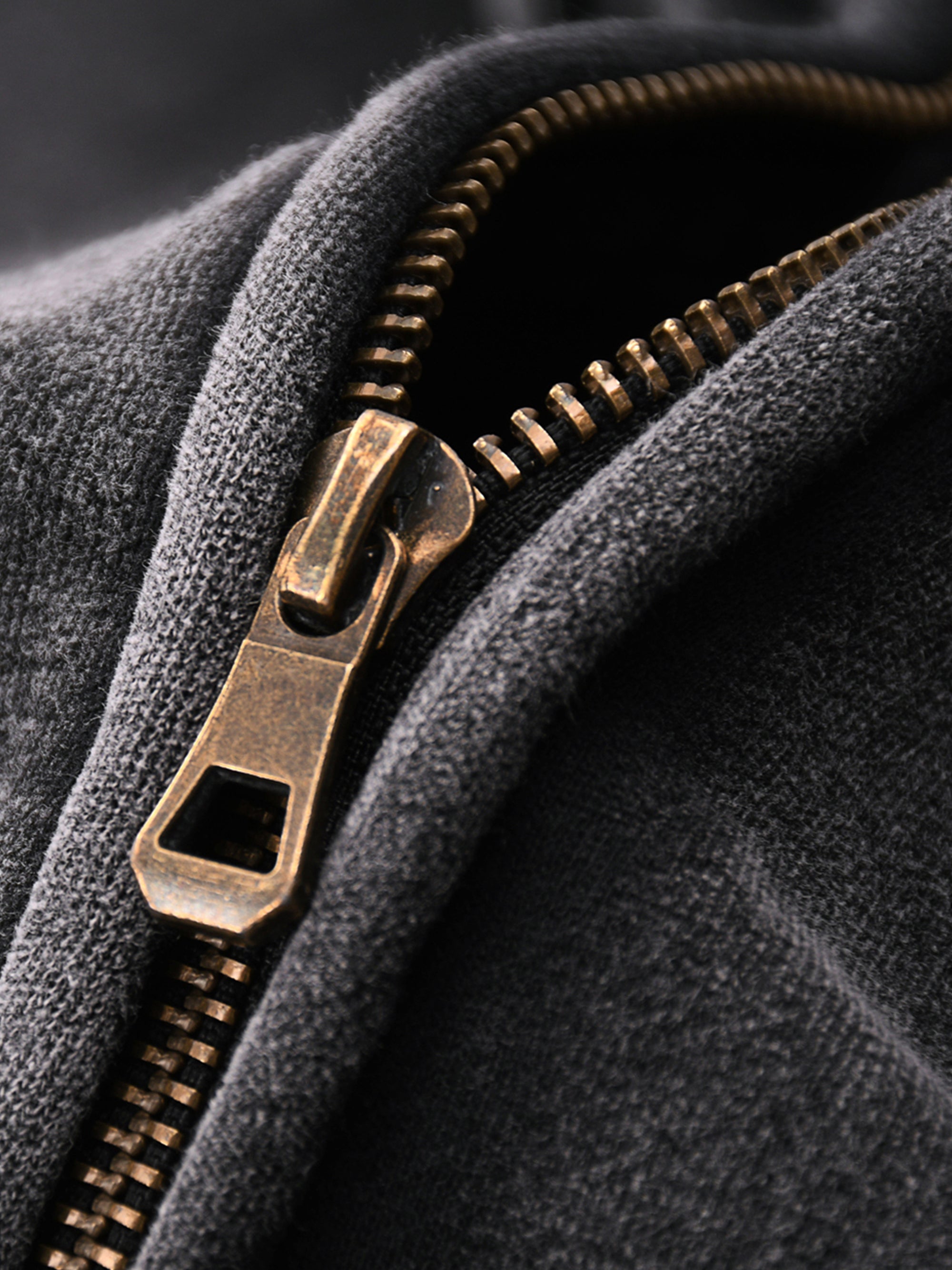 Model wearing the KND Brand boxy zip-through hoodie, side view showing drop shoulder