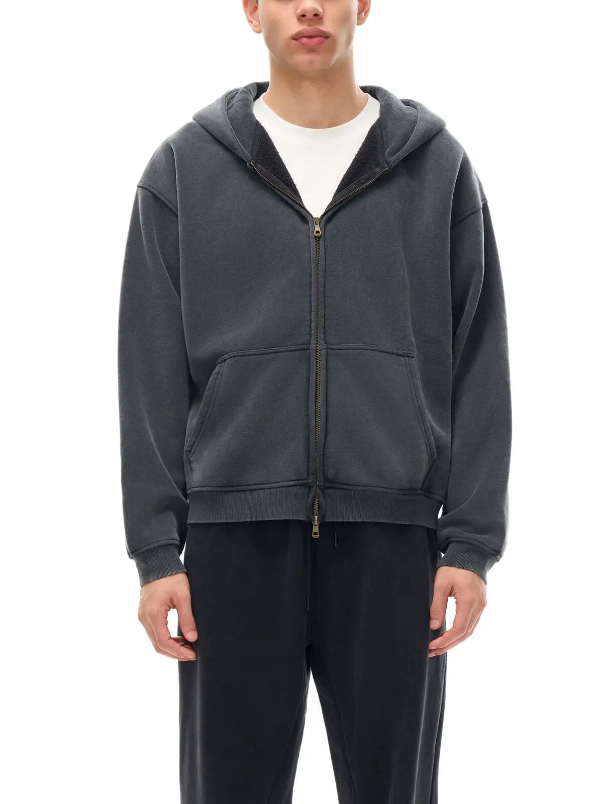 KND Brand garment-washed zip-up hoodie worn by model, oversized boxy fit