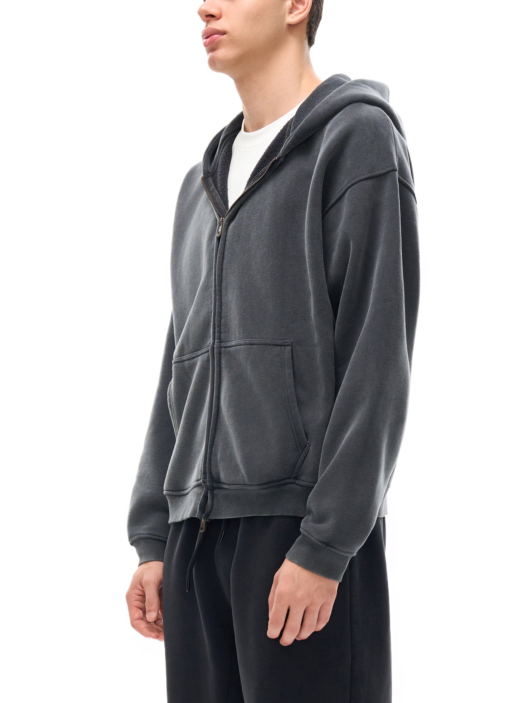 Detail of the full-length zip and lined hood on the KND Brand boxy hoodie