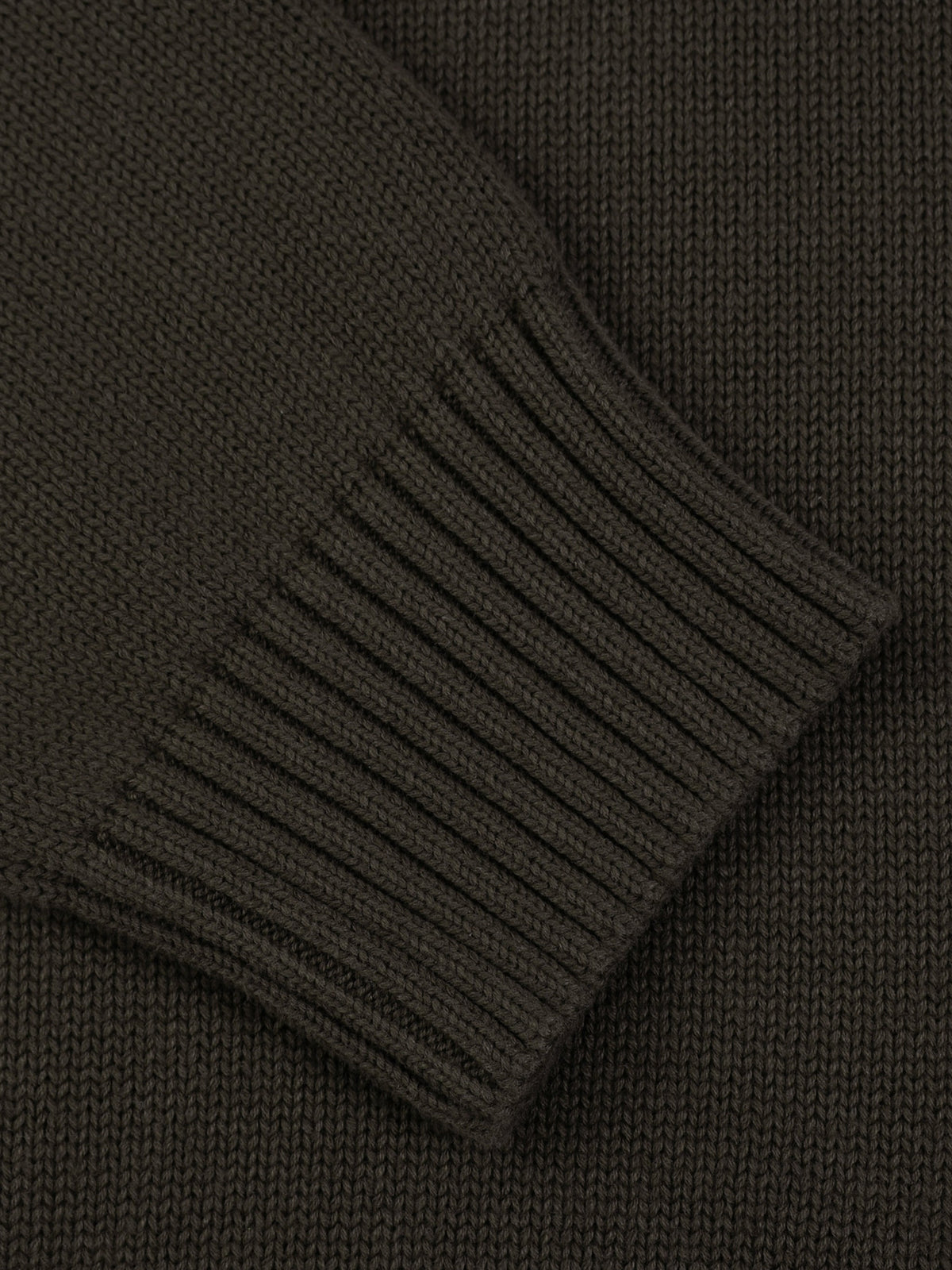 Close-up of the ribbed cuff on the KND Brand 750 gsm cotton quarter-zip sweater